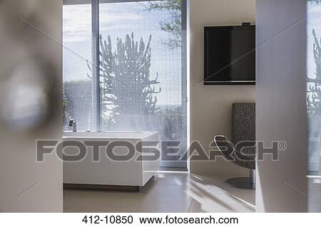 Bathtub in modern bathroom View Large Photo Image Stock Image - Bathtub in modern bathroom. Fotosearch