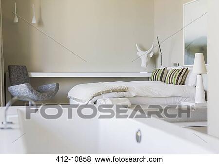 Bathtub in modern bedroom View Large Photo Image Stock Photo - Bathtub in modern bedroom. Fotosearch