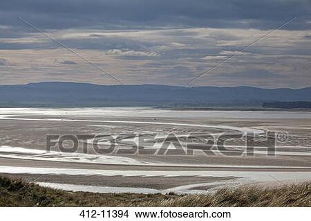 Beach at low tide View Large Photo Image Picture - Beach at low tide. Fotosearch