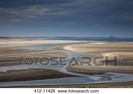 Stock Photograph - Beach at low tide. Fotosearch