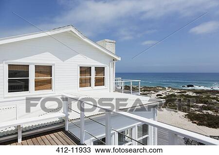 Beach house overlooking ocean View Large Photo Image Stock Image - Beach house overlooking ocean. Fotosearch