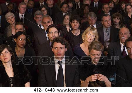 Bored woman in theater audience View Large Photo Image Stock Image - Bored woman in theater audience. Fotosearch