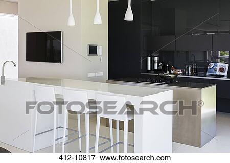 Breakfast bar in modern kitchen View Large Photo Image Stock Photo - Breakfast bar in modern kitchen. Fotosearch
