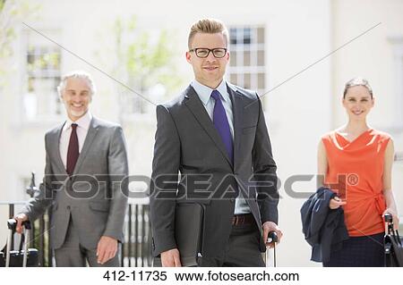 Stock Photography - Business people standing outdoors. Fotosearch