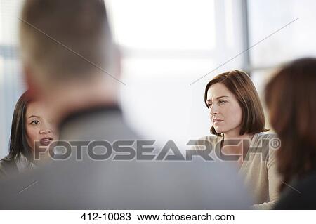 Business people talking in meeting View Large Photo Image Stock Image - Business people talking in meeting. Fotosearch