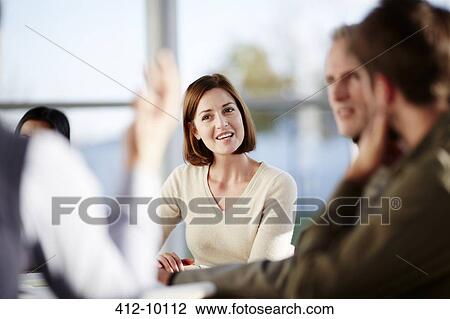 Business people talking in meeting View Large Photo Image Stock Image - Business people talking in meeting. Fotosearch
