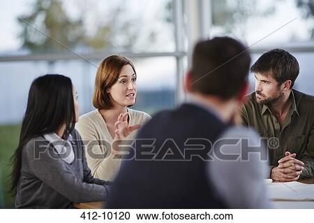 Business people talking in meeting View Large Photo Image Stock Image - Business people talking in meeting. Fotosearch