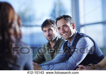 Business people talking in meeting View Large Photo Image Stock Image - Business people talking in meeting. Fotosearch