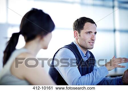 Business people talking in meeting View Large Photo Image Stock Image - Business people talking in meeting. Fotosearch