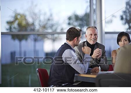 Business people talking in meeting View Large Photo Image Stock Photo - Business people talking in meeting. Fotosearch