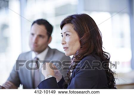 Business people talking in meeting View Large Photo Image Stock Photo - Business people talking in meeting. Fotosearch