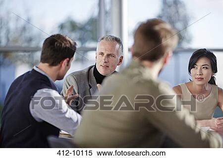 Business people talking in meeting View Large Photo Image Stock Photography - Business people talking in meeting. Fotosearch