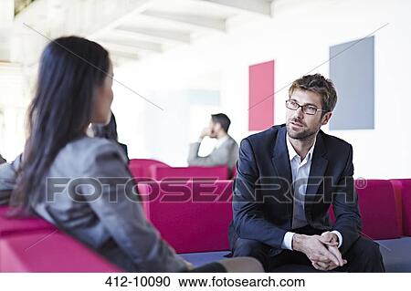 Business people talking in office View Large Photo Image Stock Image - Business people talking in office. Fotosearch