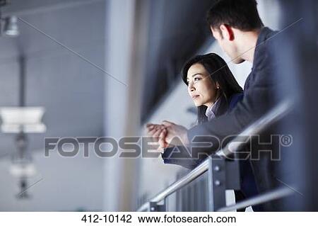 Business people talking in office View Large Photo Image Stock Image - Business people talking in office. Fotosearch