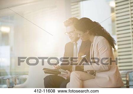 Business people talking in office View Large Photo Image Stock Photo - Business people talking in office. Fotosearch