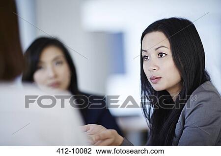 Businesswoman talking in meeting View Large Photo Image Stock Image - Businesswoman talking in meeting. Fotosearch