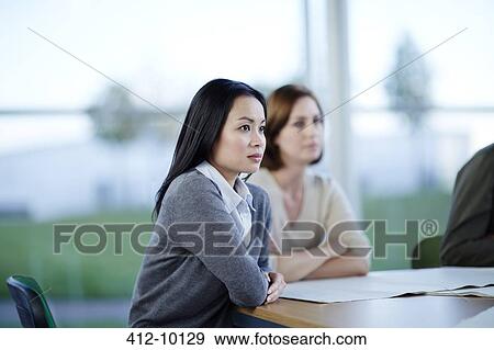Businesswomen in meeting View Large Photo Image Stock Photo - Businesswomen in meeting. Fotosearch