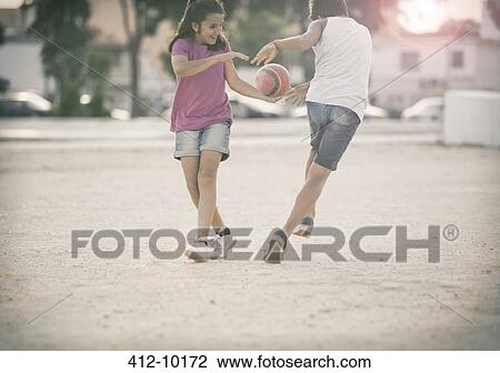 Children playing in sand View Large Photo Image Stock Image - Children playing in sand. Fotosearch