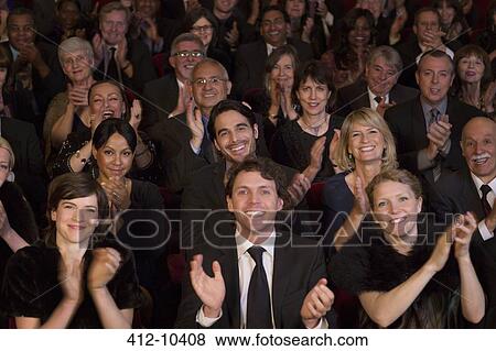 Clapping theater audience View Large Photo Image Stock Photo - Clapping theater audience. Fotosearch