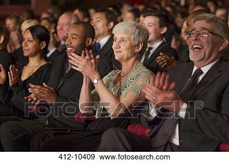 Clapping theater audience View Large Photo Image Stock Photo - Clapping theater audience. Fotosearch