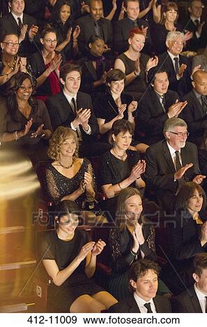Clapping theater audience View Large Photo Image Stock Photo - Clapping theater audience. Fotosearch