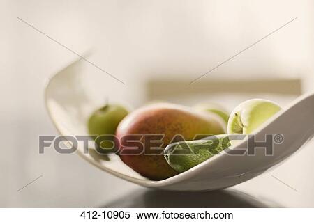 Close up of fruit in bowl View Large Photo Image Stock Photography - Close up of fruit in bowl. Fotosearch