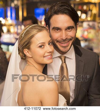 Close up portrait of smiling bride and groom View Large Photo Image Stock Image - Close up portrait of smiling bride and groom. Fotosearch