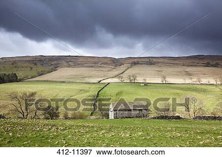 Clouds gathering over rural fields View Large Photo Image Stock Photo - Clouds gathering over rural fields. Fotosearch