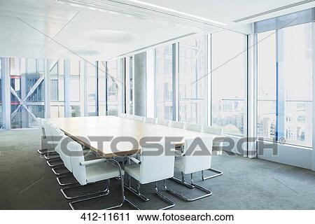 Stock Image - Empty meeting table in office. Fotosearch