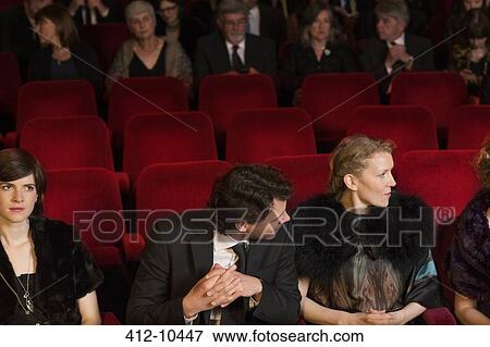 Stock Photo - Empty seats among theater audience. Fotosearch