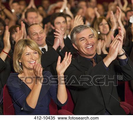 Enthusiastic theater audience clapping View Large Photo Image Stock Photography - Enthusiastic theater audience clapping. Fotosearch