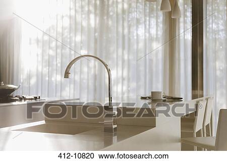 Faucet and sink in modern kitchen View Large Photo Image Stock Image - Faucet and sink in modern kitchen. Fotosearch
