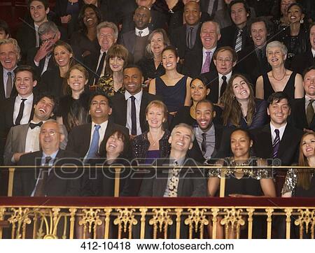 Laughing audience in theater balcony View Large Photo Image Stock Photo - Laughing audience in theater balcony. Fotosearch