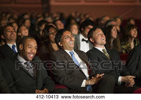 Stock Image - Laughing theater audience. Fotosearch