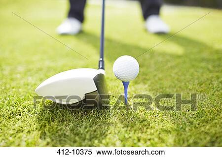 Man playing golf on course View Large Photo Image Stock Photography - Man playing golf on course. Fotosearch