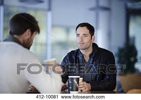 Men having coffee in cafe View Large Photo Image Stock Image - Men having coffee in cafe. Fotosearch