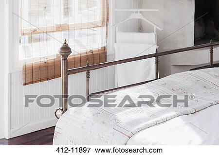 Metal frame on bed View Large Photo Image Stock Photo - Metal frame on bed. Fotosearch