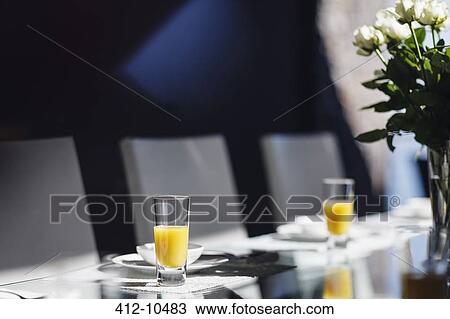 Mimosas on elegant dining table View Large Photo Image Stock Image - Mimosas on elegant dining table. Fotosearch