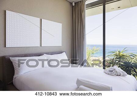 Modern bedroom with ocean view View Large Photo Image Stock Image - Modern bedroom with ocean view. Fotosearch
