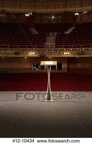 Podium on stage in empty theater View Large Photo Image Picture - Podium on stage in empty theater. Fotosearch