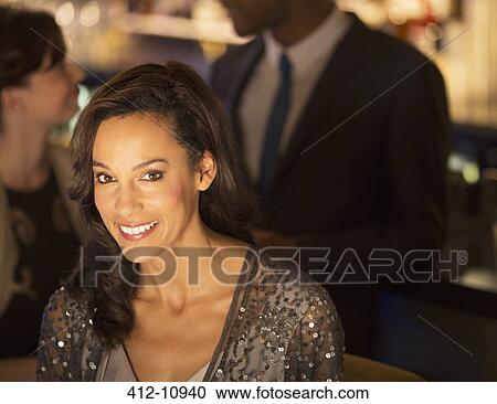 Portrait of well dressed woman smiling View Large Photo Image Stock Image - Portrait of well dressed woman smiling. Fotosearch