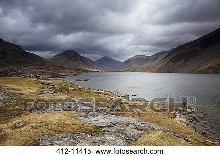 Rocky hills surrounding lake View Large Photo Image Stock Photography - Rocky hills surrounding lake. Fotosearch