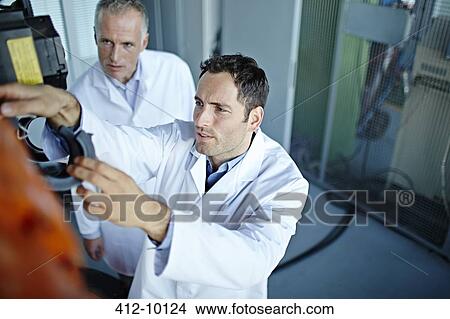 Scientists working in laboratory View Large Photo Image Picture - Scientists working in laboratory. Fotosearch