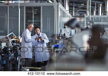 Scientists working in laboratory View Large Photo Image Stock Image - Scientists working in laboratory. Fotosearch