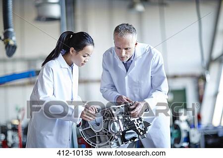 Scientists working in laboratory View Large Photo Image Stock Photography - Scientists working in laboratory. Fotosearch