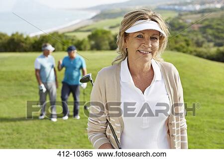 Senior friends on golf course View Large Photo Image Stock Photography - Senior friends on golf course. Fotosearch