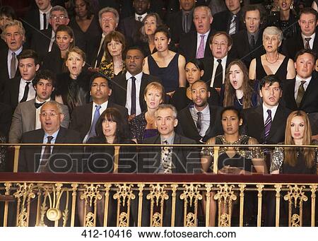 Serious audience in theater balcony View Large Photo Image Stock Photograph - Serious audience in theater balcony. Fotosearch