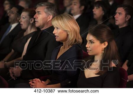 Serious theater audience View Large Photo Image Stock Photo - Serious theater audience. Fotosearch