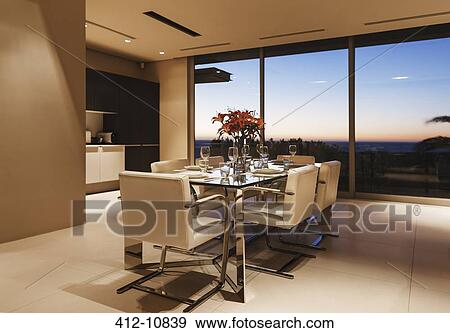 Set table in modern dining room View Large Photo Image Stock Photo - Set table in modern dining room. Fotosearch