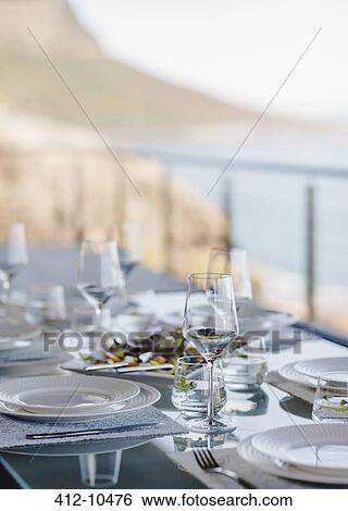 Set table on luxury patio View Large Photo Image Stock Photograph - Set table on luxury patio. Fotosearch
